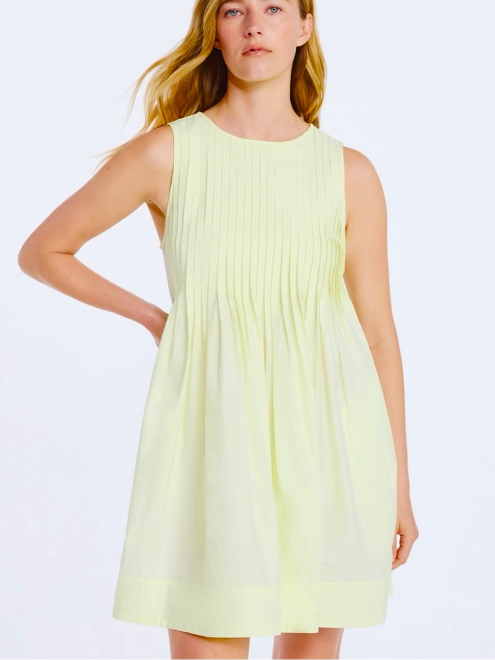 🆕 Free Assembly yellow pleated mini dress